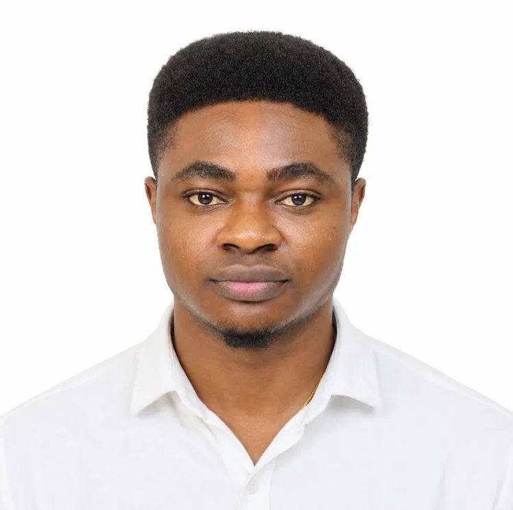 Portrait of Adah Olotu wearing a white shirt